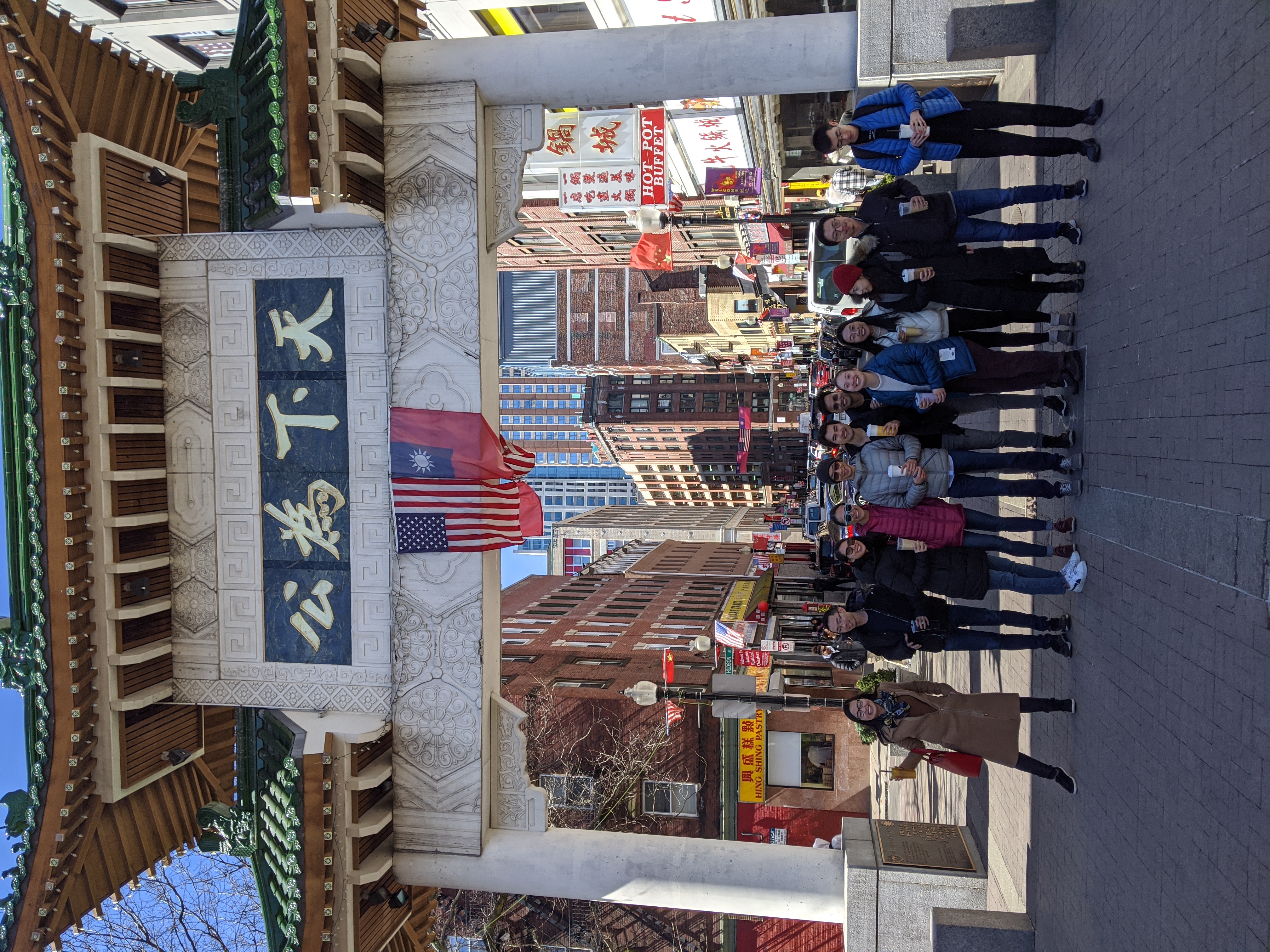 AAPI members at the gate of Chinatown in Boston, 2023